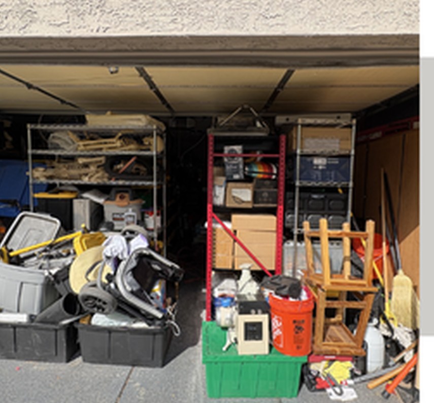 Same Phoenix garage before Garage Gals, packed with clutter